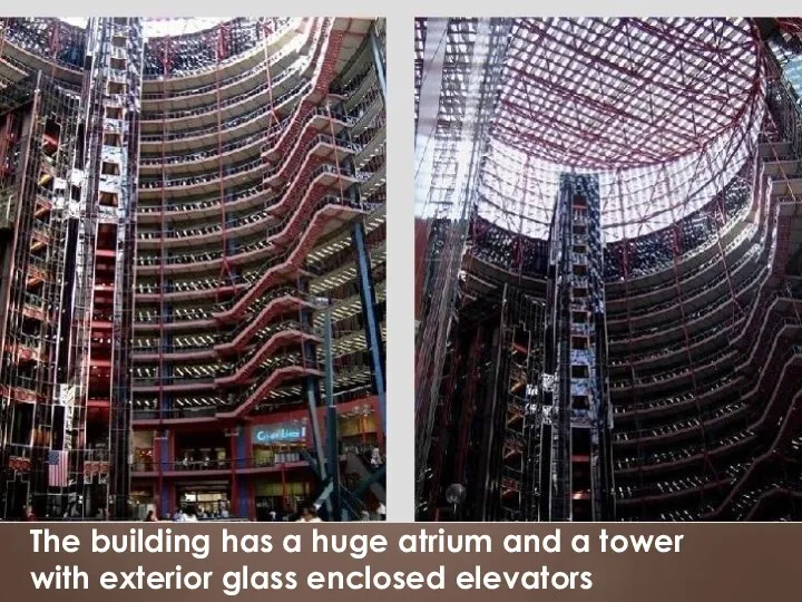 The building has a huge atrium and a tower with exterior glass enclosed elevators