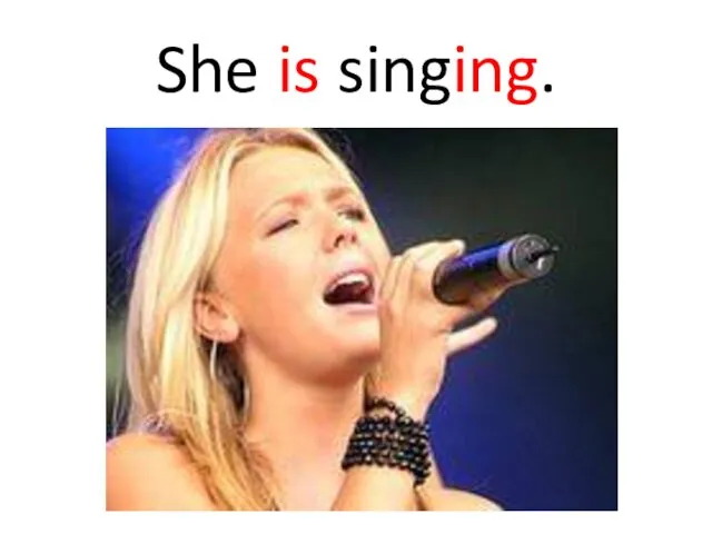 She is singing.