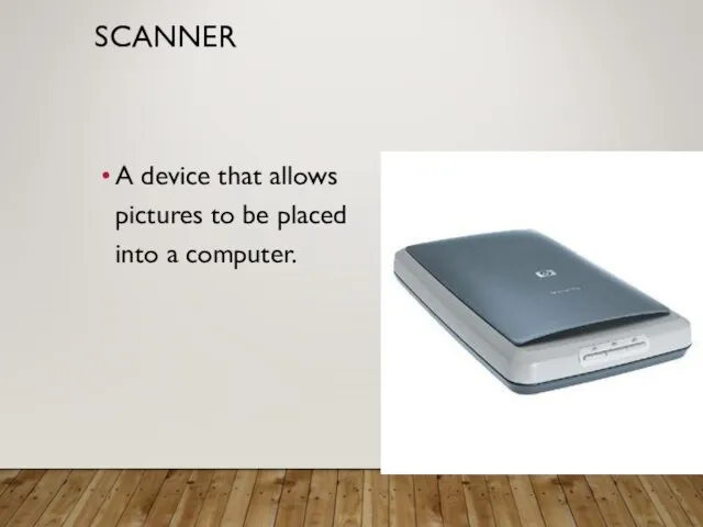 SCANNER A device that allows pictures to be placed into a computer.