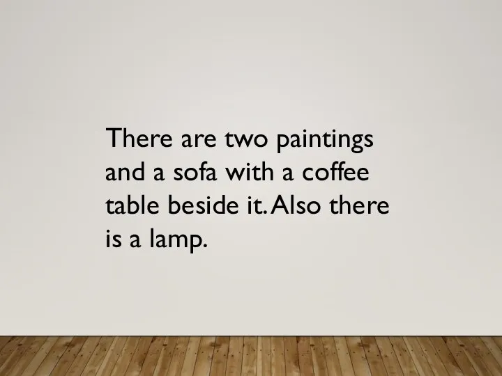There are two paintings and a sofa with a coffee table