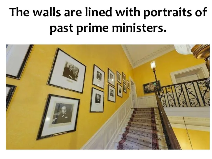 The walls are lined with portraits of past prime ministers.